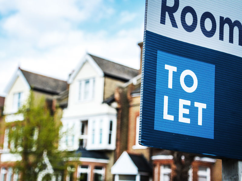 Townhouses with 'Room to Let' sign